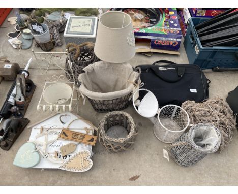 AN ASSORTMENT OF ITEMS TO INCLUDE WICKER BASKETS, SIGNS AND A LAMP ETC 
