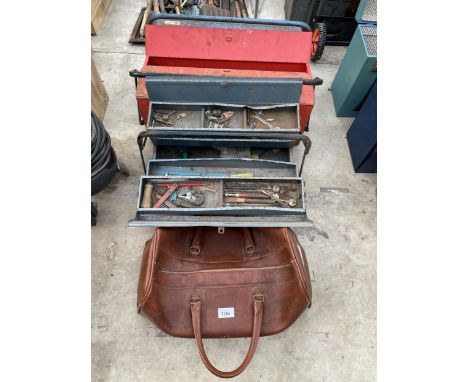 THREE METAL TOOL BOXES AND A LEATHER BAG WITH AN ASSORTMENT OF TOOLS TO INCLUDE PLIERS AND TROWELS ETC 