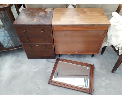 A RETRO TEAK STORAGE CUPBOARD WITH ROLLER DOOR, SMALL OAK CHEST OF FOUR DRAWERS AND MAHOGANY FRAMED MIRROR 