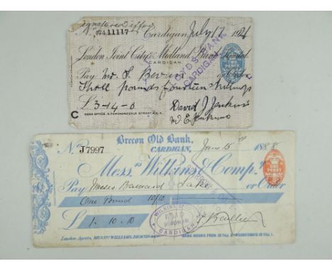 TWO EARLY REGIONAL BANK CHEQUES, comprising 1888 Brecon Old Bank, Cardigan, cheque Mssrs. Wilkins &amp; Comp'y for One Pound;