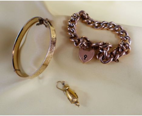 ASSORTED JEWELLERY comprising 9ct gold curb link bracelet with heart shaped padlock, 16.5gms, together with gold plated bangl