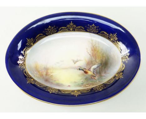 ROYAL WORCESTER JAMES STINTON PAINTED DESSERT DISH, dated 1938, retailed by Aspreys, centre decorated with a scene of mallard