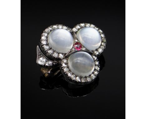 VICTORIAN MOONSTONE, RUBY & DIAMOND BROOCH of trefoil foliate design, in white metal, presumed silver frame with yellow metal