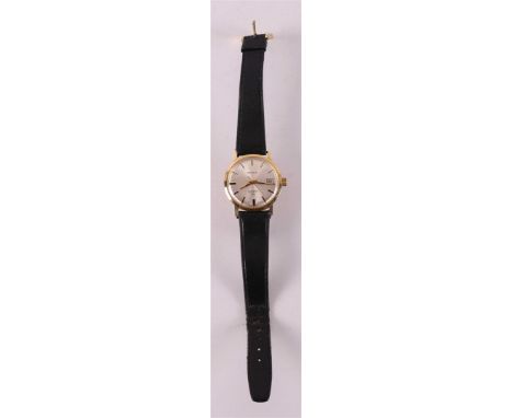A vintage Remova men's wristwatch in 14 kt 585/1000 gold case, on black leather strap, running mechanical movement with date,