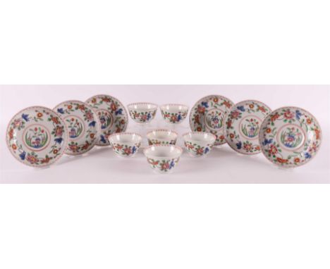 A series of six porcelain cups and saucers, China, 19th century. Polychrome floral decor, marked with six-character mark 'Kan