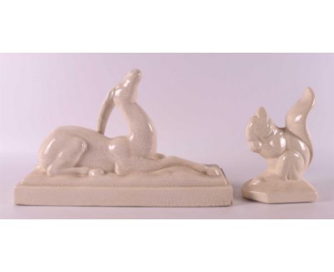 A white earthenware Art Deco antelope, France ca. 1930. Charles Lemanceau or surroundings, h 21 x l 31 cm. Here is ditto eart