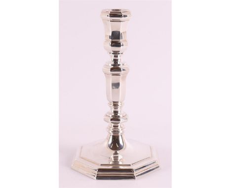A second grade 835/1000 silver one-light candlestick in Louis XIV style, 20th century, 174.5 grams, h 18 cm.