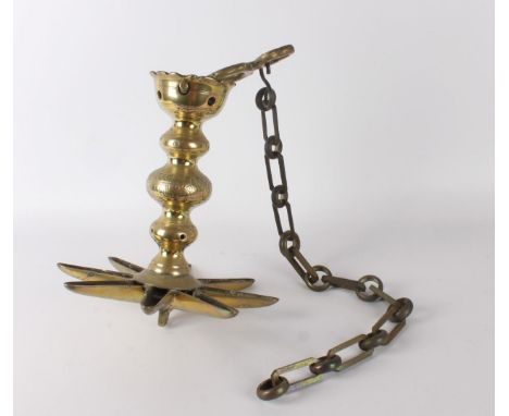 Judaica. A bronze Shabbat hanging oil lamp on a chain, l 57 cm.
