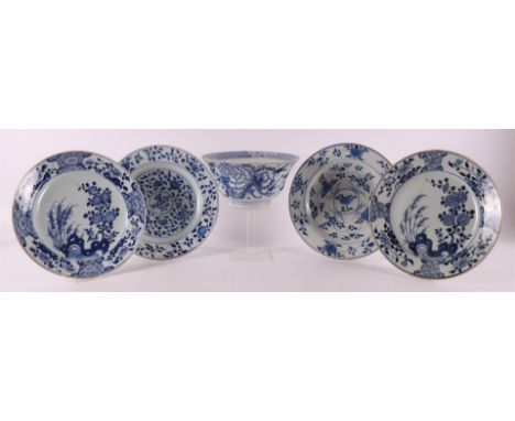 A blue/white porcelain bowl on stand ring, China, Kangxi style, 19th century. Blue underglaze floral decor including chrysant