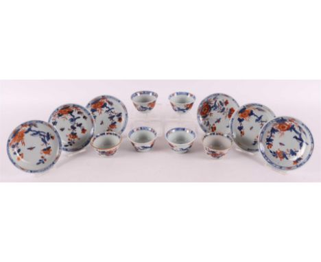 Six porcelain Chinese Imari cups and saucers, China, Qianlong 18th century. Blue/red, partly gold heightened decor of birds o