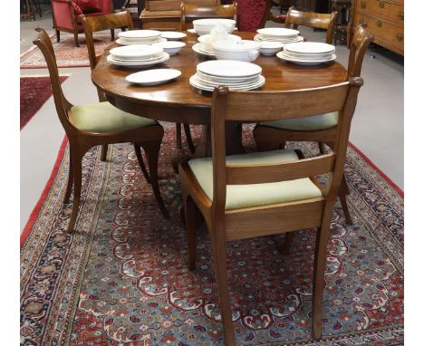 A round Biedermeier backstage table, 1st half of the 19th century. Mahogany, on conical trunk with tripod, h 76 x Ø 104 cm (+