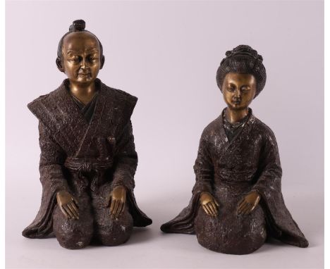 A bronze kneeling samurai and geisha, Japan, after an antique example, 20th century, h 21 cm, to. 2x.