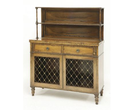 A Regency rosewood chiffonier/desk,with two-shelf back, fold-out writing surface and two brass grille doors,92cm wide38cm dee