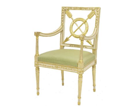 A French Empire-style elbow chair, early 20th century, with an arrow and laurel wreath splat, painted and gilded all over, 92