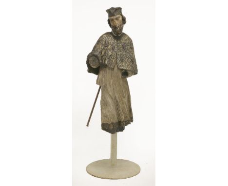 A painted and carved limewood sculpture,depicting John of Nepomuk, probably Bohemian, 17th century, 128cm highSt John of Nepo