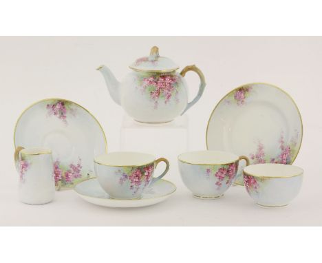 A Royal Worcester tea set for two,dated 1937, painted with pink flowers, by H Everett, on a light blue ground, comprising:tea