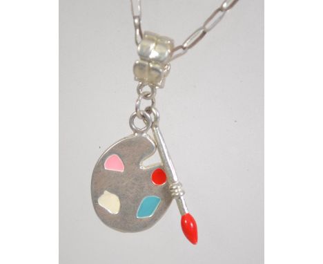 A silver 925 spaced box link necklace chain with spring hoop clasp having an unusual artists palette and paint brush drop pen