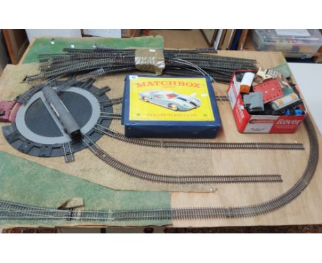 A 'Matchbox Series Collectors Case', in addition to a collection of unboxed locomotives, accessories and railway track, to in