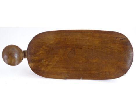 Tribal art, an African animal like rectangular dish with circular part to one end, 62cm long.