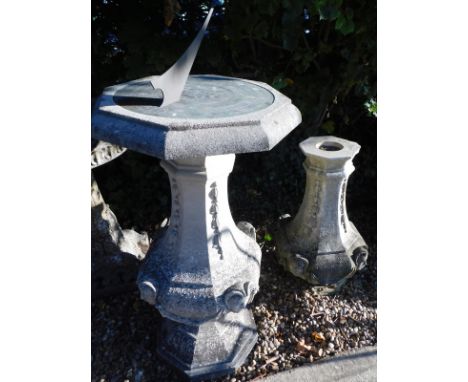 A modern engraved brass sundial, mounted on a neo classical style composition base, 120cm high, 56cm wide, and a similar base