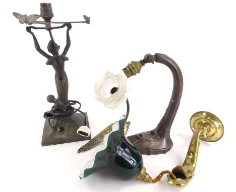 A collection of lighting, to include a brass wall light with green glass shade and two Art Nouveau bronzed metal lamp bases