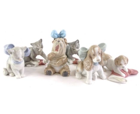 A collection of Nao porcelain animals, to include cats and dogs. (1 boxed) 