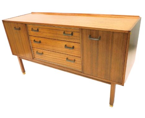 A 1960's/70's retro style teak sideboard, with a raised back, above three drawers, flanked by two doors, each with plated han