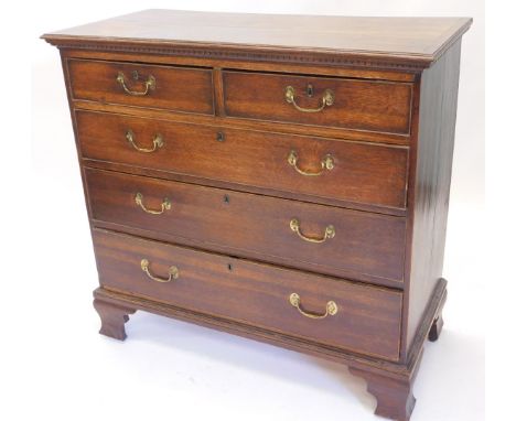 An early 19thC oak chest, of two short three long drawers with brass drop handles and bracket feet. 110cm W.