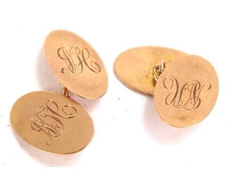 A pair of 9ct gold oval cufflinks, bearing the initials AH, (AF), 4.6g all in.