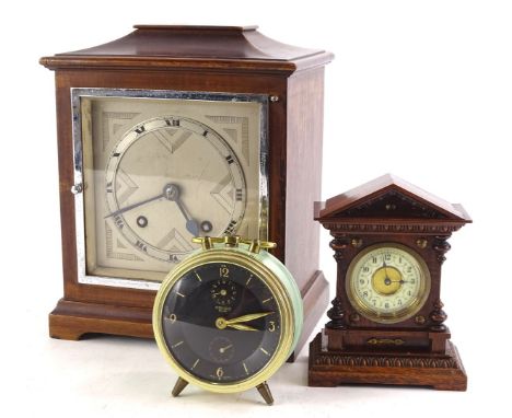 A collection of mantel clocks, to include a mahogany Art Deco style piece with German brass movement and chrome plated dial e