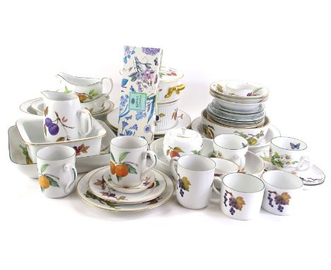 A quantity of Royal Worcester Evesham porcelain dinner and tea ware, some pieces of Worcester herbs etc.