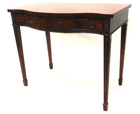 A mahogany side table, with a cross banded top, serpentine front and two frieze drawers on square tapering legs, 91cm W.