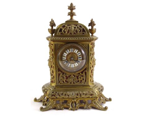 A French gilt brass mantel timepiece, with enamel Roman numerals, 40cm high