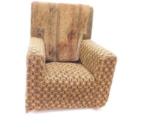 An Art Deco child's chair, with original upholstery.