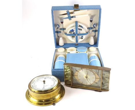 A Brexton picnic set, in blue and white, a Metamec mantel clock and an aneroid barometer stamped John Barker & Co Kensington.