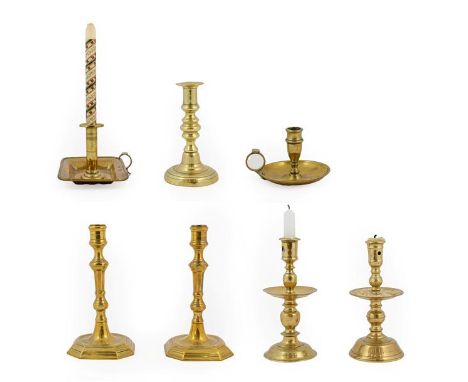 ~ A Dutch Brass Heemskirk-Type Candlestick, 17th century, with central drip pan, knopped stem and domed foot, 21cm high; A Si