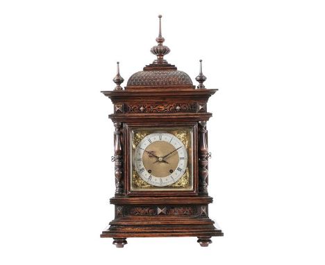 An Oak Quarter Striking Bracket Clock, circa 1890, caddied pediment with turned wooden finials, sound fret side doors, 6-1/2-