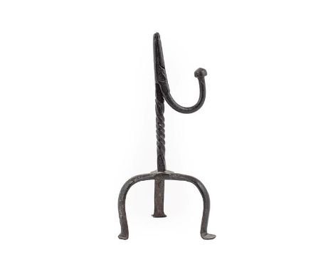 ~ A Wrought Iron Rushlight Holder, 18th century, with ball knop on wrythen stem and scroll tripod base, 24cm high