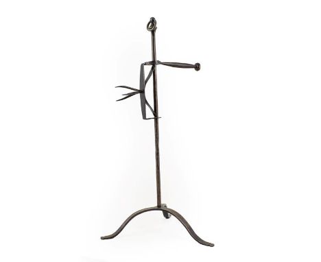 ~ A Steel Lark Spit, late 18th/19th century, with coronet finial on a tripod base, 48cm high