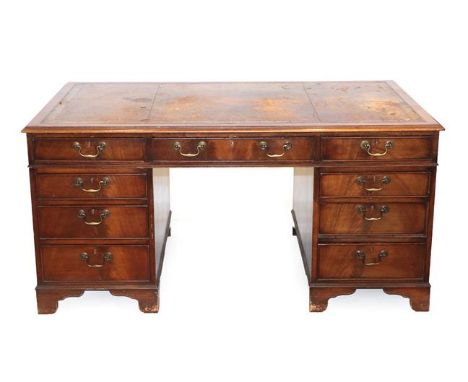 An Early 20th Century Mahogany Double Pedestal Desk, labelled S &amp; H Jewell, 26 Parker Street, London WC2, with inset worn