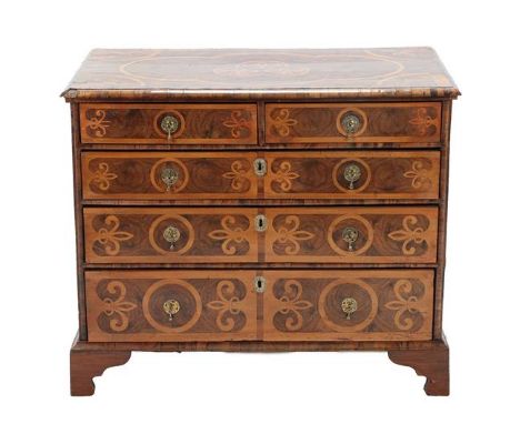 A William & Mary Walnut, Oyster and Marquetry Inlaid Straight Front Chest, late 17th century, the top inlaid with fleur de ly