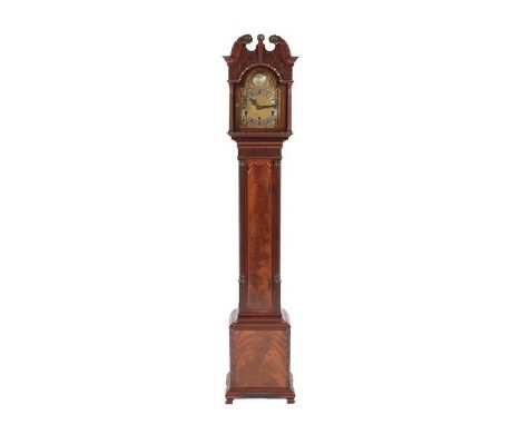 A Small Chiming Mahogany Longcase Clock, circa 1930, swan neck pediment, case with blind frets, wavy shaped trunk door flanke