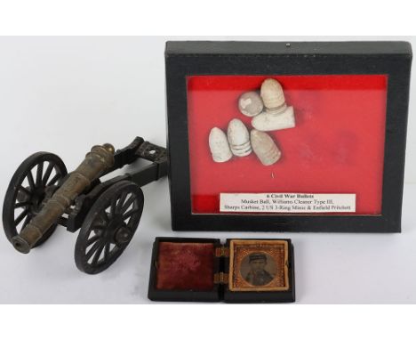 U.S. Civil War Ambrotype Uniform Photograph: Small decorative case which opens out  with uniform photograph inside , 5 cm x 5