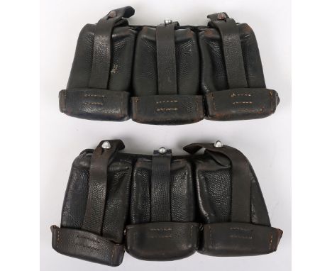 WW2 German Army K98 Ammunition Pouches: A near matched pair of black leather k98 pouches with alloy metal work, one being sta