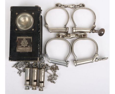 Vintage Police Handcuffs and Whistles: Kent Constabulary light, two pairs of hand cuffs with keys and three whistles. 6 items