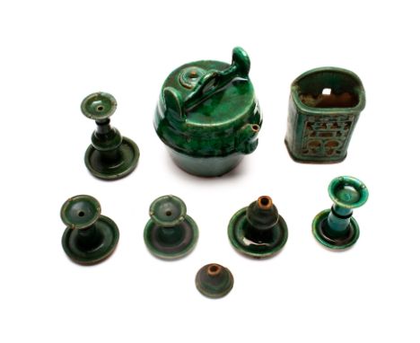 A GROUP OF CHINESE GREEN GLAZED POTTERY ITEMS
Including various Shiwan oil lamps (one damaged), a wall mounted chopstick hold