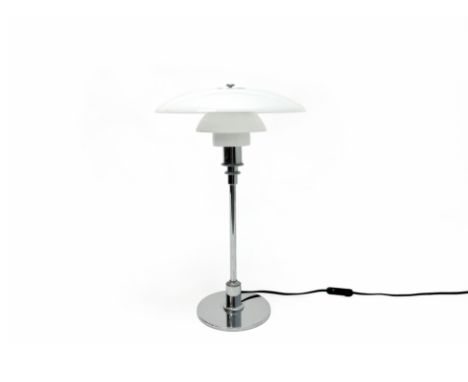 A LOUIS POULSON GLASS AND CHROME PLATED TABLE LAMP
With three tiered opaque glass shade and chrome plated base
46cm high
Cond