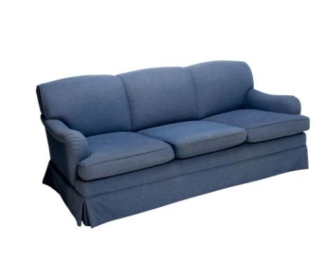 A GEORGE SMITH SIGNATURE THREE SEAT SOFA
In blue fabric upholstery, on turned supports and castors
212cm wide, 85cm high, app