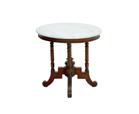 A CIRCULAR MARBLE TOPPED TEAK KOPITIAM TABLE
The white marble top on four turned supports and scroll feet
75cm high, 80cm dia