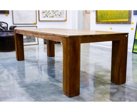 A LARGE TEAK DINING TABLE
Retailed by Journey East, Singapore, the rectagular table on four large square supports
77 x 260 x 